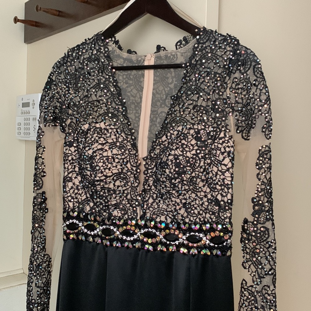 A black and nude womens dress